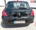 Чорний Пежо 308, об'ємом двигуна 1.6 л та пробігом 320 тис. км за 6429 $, фото 11 на Automoto.ua