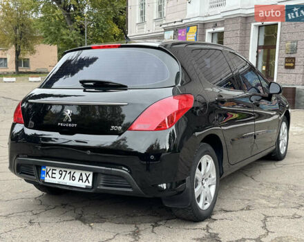 Чорний Пежо 308, об'ємом двигуна 1.6 л та пробігом 160 тис. км за 7300 $, фото 7 на Automoto.ua