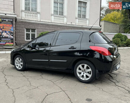 Чорний Пежо 308, об'ємом двигуна 1.6 л та пробігом 160 тис. км за 7300 $, фото 4 на Automoto.ua
