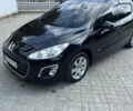 Черный Пежо 308, объемом двигателя 1.6 л и пробегом 100 тыс. км за 7300 $, фото 1 на Automoto.ua