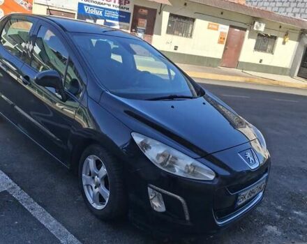 Чорний Пежо 308, об'ємом двигуна 1.6 л та пробігом 200 тис. км за 6700 $, фото 3 на Automoto.ua