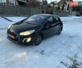 Черный Пежо 308, объемом двигателя 1.6 л и пробегом 145 тыс. км за 7350 $, фото 1 на Automoto.ua