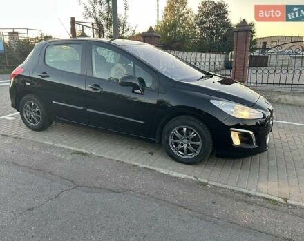 Черный Пежо 308, объемом двигателя 1.6 л и пробегом 145 тыс. км за 7400 $, фото 6 на Automoto.ua