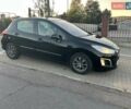 Черный Пежо 308, объемом двигателя 1.6 л и пробегом 145 тыс. км за 7400 $, фото 6 на Automoto.ua