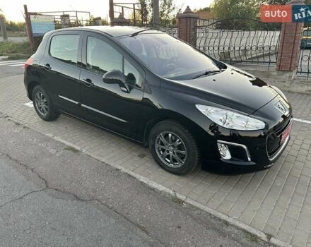 Черный Пежо 308, объемом двигателя 1.6 л и пробегом 145 тыс. км за 7400 $, фото 4 на Automoto.ua