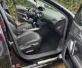 Черный Пежо 308, объемом двигателя 2 л и пробегом 233 тыс. км за 11500 $, фото 6 на Automoto.ua