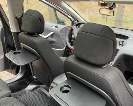 Черный Пежо 308, объемом двигателя 1.6 л и пробегом 233 тыс. км за 4500 $, фото 6 на Automoto.ua