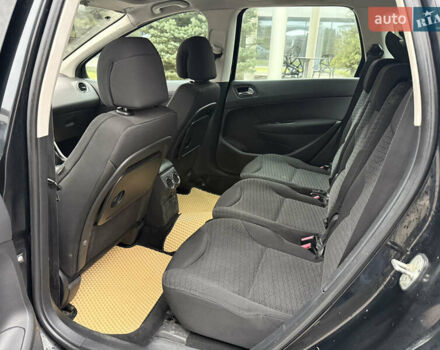 Черный Пежо 308, объемом двигателя 1.56 л и пробегом 240 тыс. км за 3500 $, фото 10 на Automoto.ua