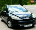 Черный Пежо 308, объемом двигателя 1.6 л и пробегом 248 тыс. км за 4570 $, фото 1 на Automoto.ua