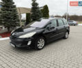 Черный Пежо 308, объемом двигателя 1.56 л и пробегом 240 тыс. км за 3500 $, фото 1 на Automoto.ua