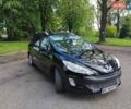 Черный Пежо 308, объемом двигателя 1.6 л и пробегом 299 тыс. км за 4850 $, фото 1 на Automoto.ua