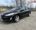 Черный Пежо 308, объемом двигателя 2 л и пробегом 283 тыс. км за 6200 $, фото 1 на Automoto.ua