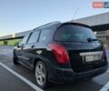 Черный Пежо 308, объемом двигателя 2 л и пробегом 292 тыс. км за 7299 $, фото 3 на Automoto.ua