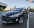 Черный Пежо 308, объемом двигателя 2 л и пробегом 292 тыс. км за 7299 $, фото 1 на Automoto.ua