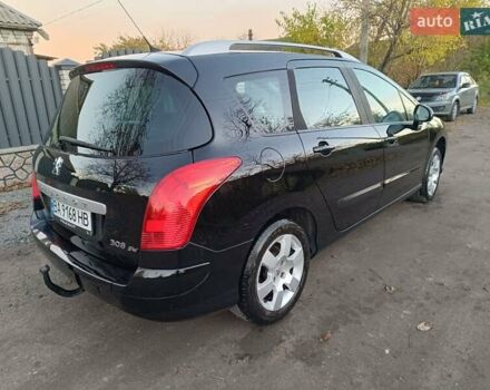 Чорний Пежо 308, об'ємом двигуна 1.6 л та пробігом 190 тис. км за 4800 $, фото 4 на Automoto.ua