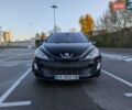 Черный Пежо 308, объемом двигателя 2 л и пробегом 292 тыс. км за 7299 $, фото 1 на Automoto.ua