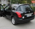 Чорний Пежо 308, об'ємом двигуна 1.4 л та пробігом 265 тис. км за 4299 $, фото 1 на Automoto.ua