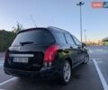 Черный Пежо 308, объемом двигателя 2 л и пробегом 292 тыс. км за 7299 $, фото 5 на Automoto.ua