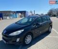 Черный Пежо 308, объемом двигателя 2 л и пробегом 251 тыс. км за 4100 $, фото 1 на Automoto.ua