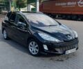 Черный Пежо 308, объемом двигателя 1.6 л и пробегом 217 тыс. км за 4499 $, фото 1 на Automoto.ua