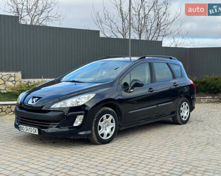 Черный Пежо 308, объемом двигателя 1.4 л и пробегом 251 тыс. км за 4300 $, фото 1 на Automoto.ua