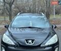 Черный Пежо 308, объемом двигателя 1.56 л и пробегом 250 тыс. км за 5700 $, фото 1 на Automoto.ua