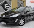Черный Пежо 308, объемом двигателя 1.6 л и пробегом 255 тыс. км за 5200 $, фото 1 на Automoto.ua