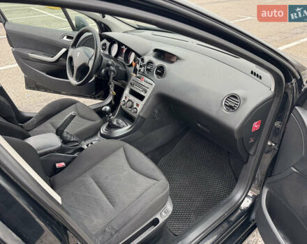 Черный Пежо 308, объемом двигателя 1.56 л и пробегом 225 тыс. км за 5500 $, фото 7 на Automoto.ua