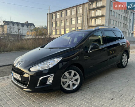 Чорний Пежо 308, об'ємом двигуна 1.6 л та пробігом 270 тис. км за 6199 $, фото 6 на Automoto.ua