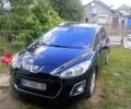 Черный Пежо 308, объемом двигателя 1.56 л и пробегом 274 тыс. км за 6500 $, фото 1 на Automoto.ua