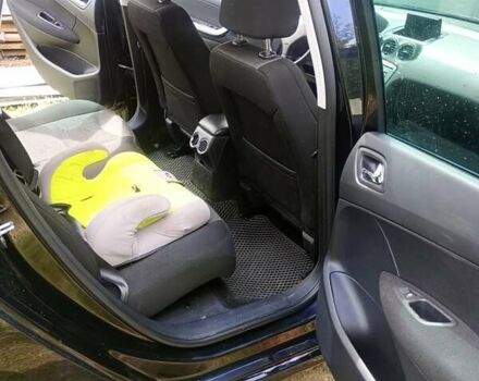 Черный Пежо 308, объемом двигателя 1.56 л и пробегом 274 тыс. км за 6500 $, фото 15 на Automoto.ua