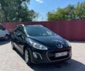 Чорний Пежо 308, об'ємом двигуна 1.56 л та пробігом 252 тис. км за 4300 $, фото 1 на Automoto.ua