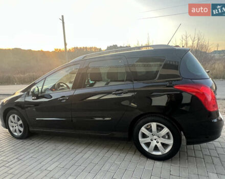 Чорний Пежо 308, об'ємом двигуна 1.6 л та пробігом 270 тис. км за 6199 $, фото 9 на Automoto.ua