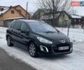 Черный Пежо 308, объемом двигателя 1.56 л и пробегом 257 тыс. км за 7200 $, фото 1 на Automoto.ua