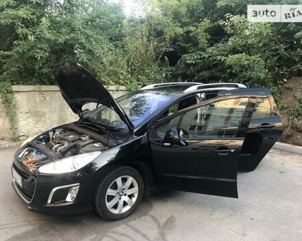 Чорний Пежо 308, об'ємом двигуна 1.6 л та пробігом 242 тис. км за 7000 $, фото 26 на Automoto.ua