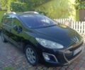 Черный Пежо 308, объемом двигателя 2 л и пробегом 256 тыс. км за 5299 $, фото 1 на Automoto.ua