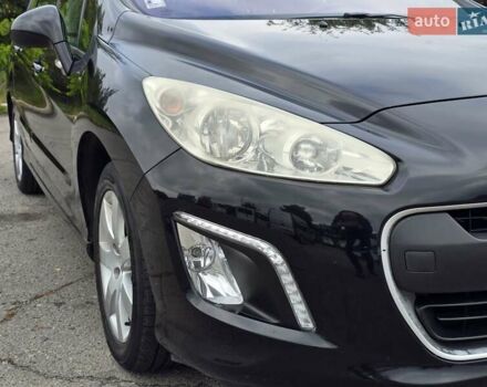 Черный Пежо 308, объемом двигателя 1.6 л и пробегом 161 тыс. км за 6499 $, фото 11 на Automoto.ua