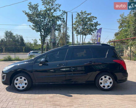 Чорний Пежо 308, об'ємом двигуна 1.6 л та пробігом 245 тис. км за 6300 $, фото 6 на Automoto.ua