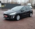 Черный Пежо 308, объемом двигателя 1.6 л и пробегом 173 тыс. км за 5600 $, фото 1 на Automoto.ua
