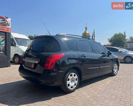 Чорний Пежо 308, об'ємом двигуна 1.6 л та пробігом 245 тис. км за 6300 $, фото 4 на Automoto.ua