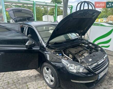 Чорний Пежо 308, об'ємом двигуна 1.56 л та пробігом 265 тис. км за 7600 $, фото 5 на Automoto.ua