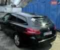 Черный Пежо 308, объемом двигателя 1.56 л и пробегом 260 тыс. км за 5900 $, фото 1 на Automoto.ua