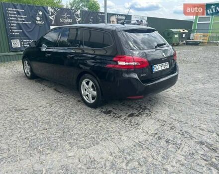 Чорний Пежо 308, об'ємом двигуна 1.56 л та пробігом 265 тис. км за 7600 $, фото 6 на Automoto.ua