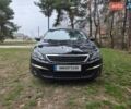 Черный Пежо 308, объемом двигателя 1.56 л и пробегом 225 тыс. км за 9000 $, фото 1 на Automoto.ua