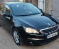 Черный Пежо 308, объемом двигателя 2 л и пробегом 213 тыс. км за 10500 $, фото 1 на Automoto.ua