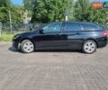 Черный Пежо 308, объемом двигателя 1.56 л и пробегом 200 тыс. км за 9900 $, фото 1 на Automoto.ua