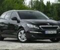 Черный Пежо 308, объемом двигателя 1.6 л и пробегом 244 тыс. км за 9800 $, фото 1 на Automoto.ua