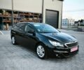 Черный Пежо 308, объемом двигателя 1.56 л и пробегом 231 тыс. км за 8600 $, фото 1 на Automoto.ua