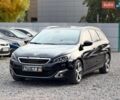 Черный Пежо 308, объемом двигателя 2 л и пробегом 245 тыс. км за 12800 $, фото 1 на Automoto.ua