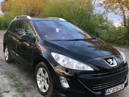 Чорний Пежо 308, об'ємом двигуна 2 л та пробігом 228 тис. км за 6400 $, фото 1 на Automoto.ua